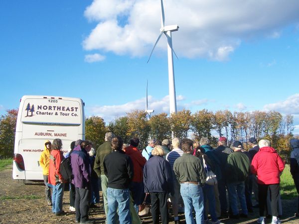 photo of a large community wind turbine
