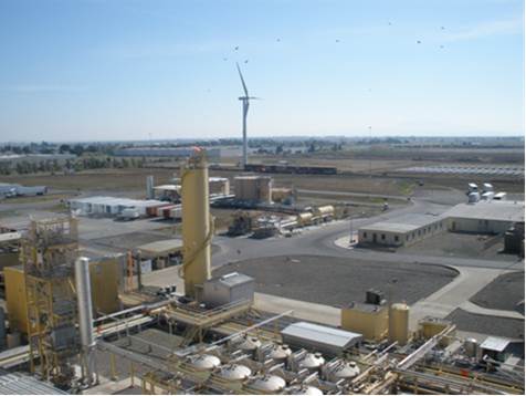 photo of a wind turbine in a commercial setting